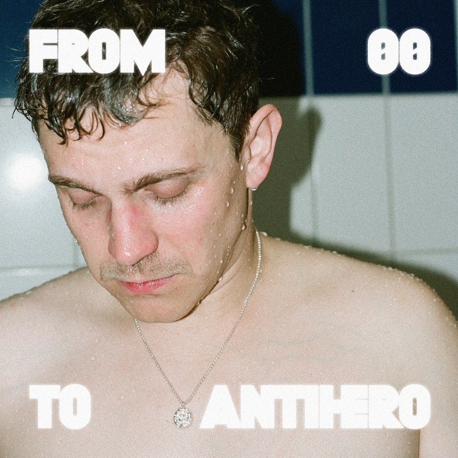 From 00 to Antihero cover: Jakob 00, wet hair and eyes closed, in a tiled bathroom
